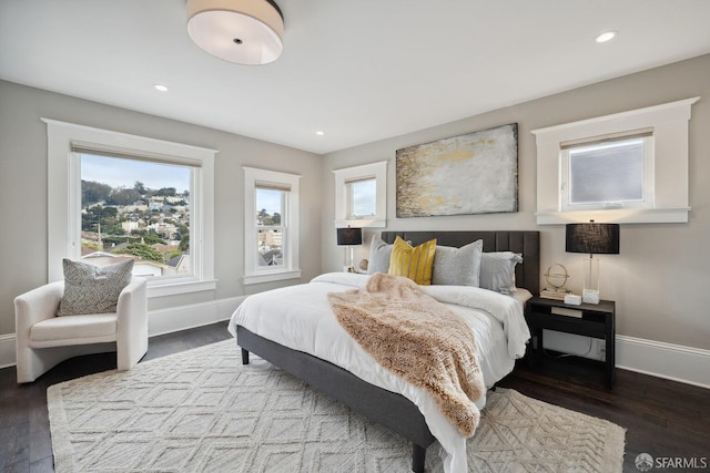 bedroom with wood-type flooring