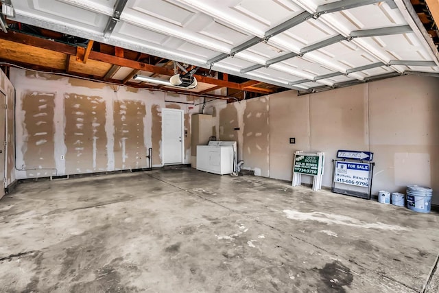 1607 California Dr, Vacaville, CA 95687 - garage featuring washing machine and dryer and a garage door opener