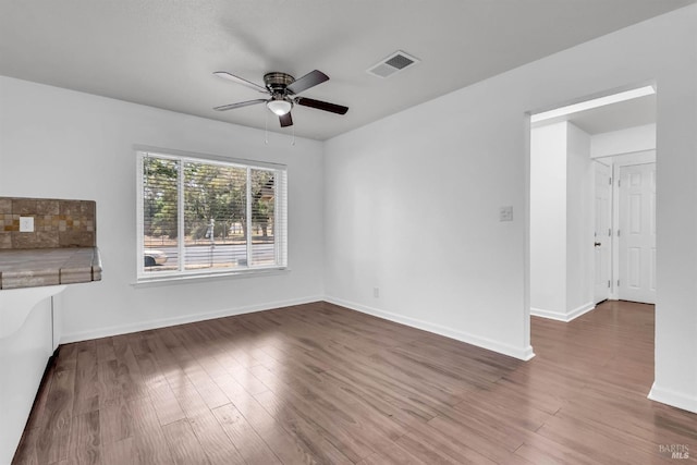 1607 California Dr, Vacaville, CA 95687 - unfurnished living room with a ceiling fan and wood finished floors