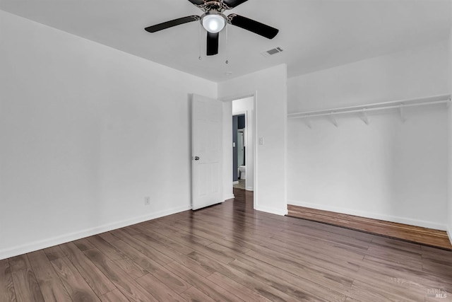 1607 California Dr, Vacaville, CA 95687 - unfurnished bedroom with wood finished floors, a ceiling fan, and a closet