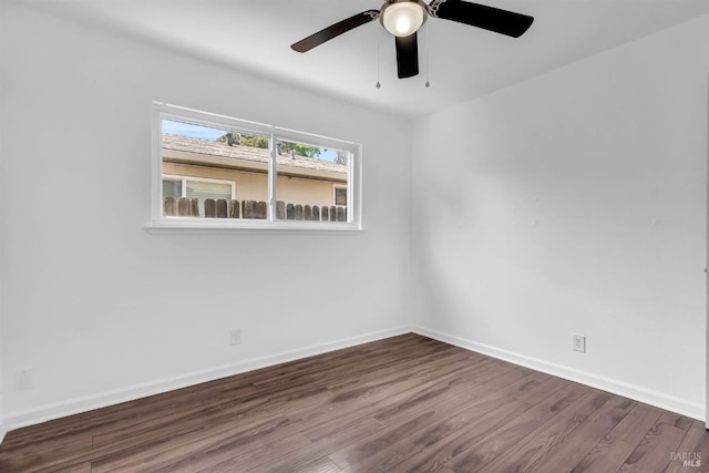 1607 California Dr, Vacaville, CA 95687 - empty room with dark wood-style floors and ceiling fan