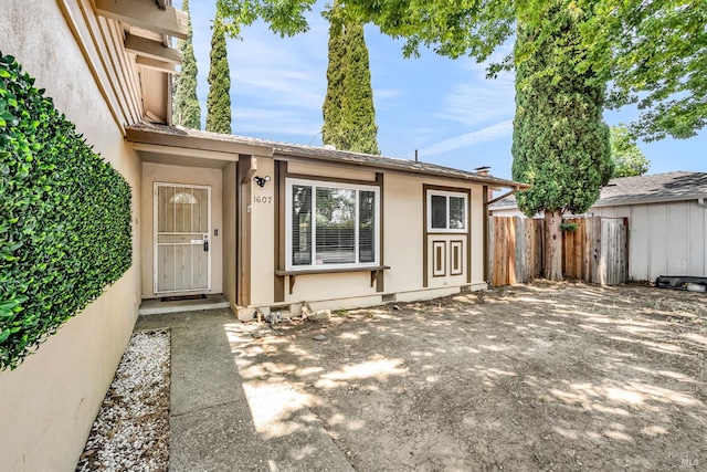 1607 California Dr, Vacaville, CA 95687 - entrance to property with stucco siding