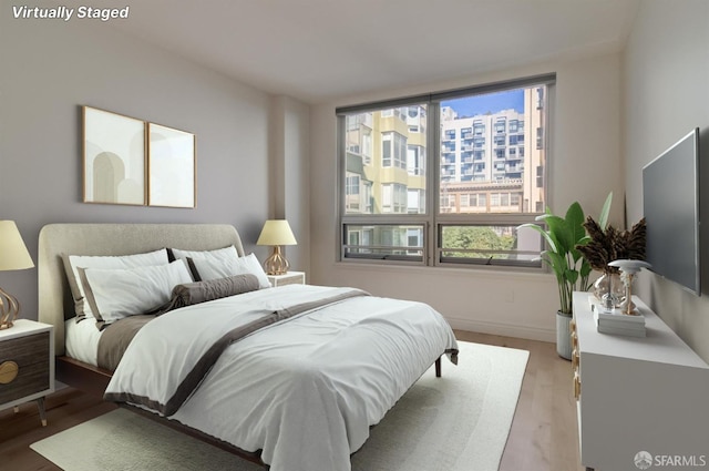 bedroom featuring hardwood / wood-style flooring