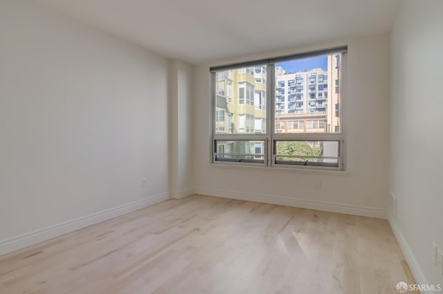 empty room featuring light wood-type flooring