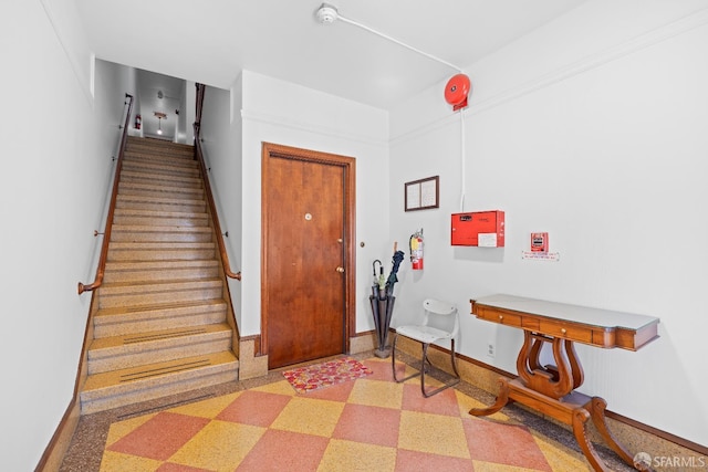 59 Collingwood St, San Francisco, CA 94114 - foyer featuring baseboards, stairs, and light flooring