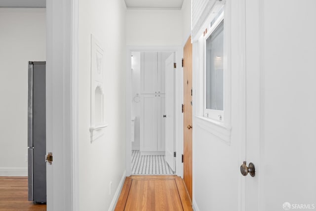59 Collingwood St, San Francisco, CA 94114 - hallway featuring wood finished floors, baseboards, and ornamental molding
