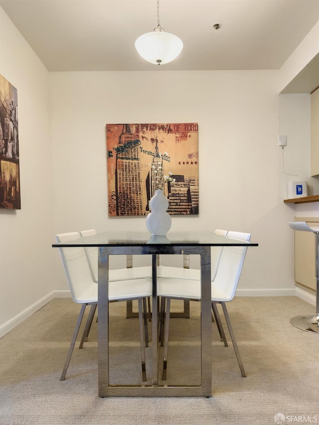 dining area with carpet