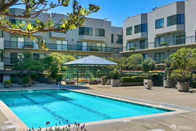 view of pool featuring a gazebo and a patio area