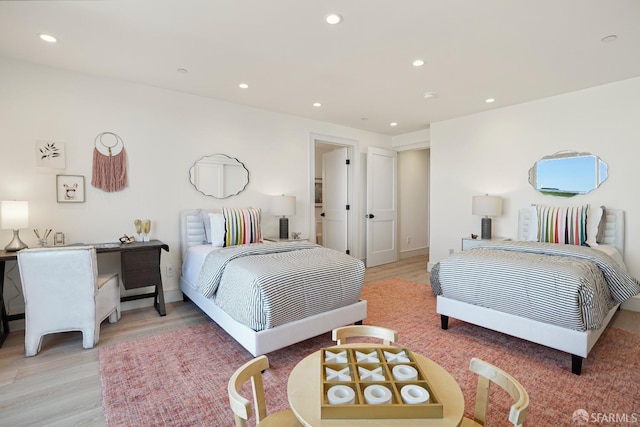 bedroom featuring light wood-style floors and recessed lighting