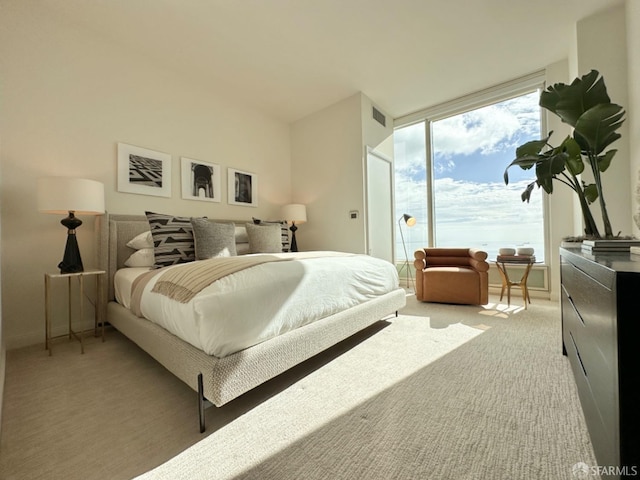 401 Harrison St Unit 48C, San Francisco, CA 94105 - bedroom with visible vents and light carpet