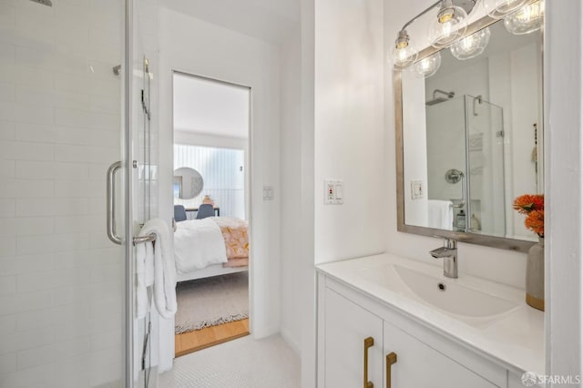 ensuite bathroom featuring ensuite bath, vanity, and a stall shower