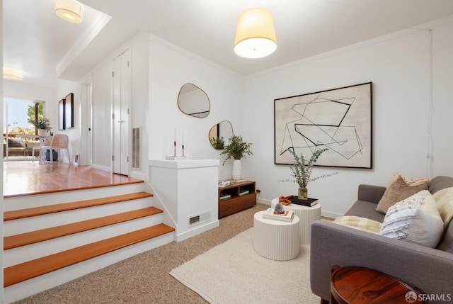 carpeted living room featuring crown molding