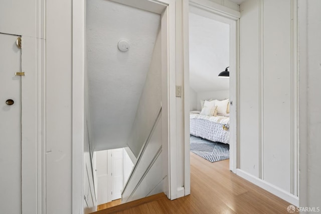 773 15th Ave, San Francisco, CA 94118 - corridor featuring wood finished floors, an upstairs landing, and baseboards