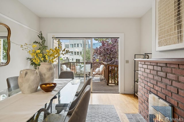 773 15th Ave, San Francisco, CA 94118 - dining space with wood finished floors and a brick fireplace
