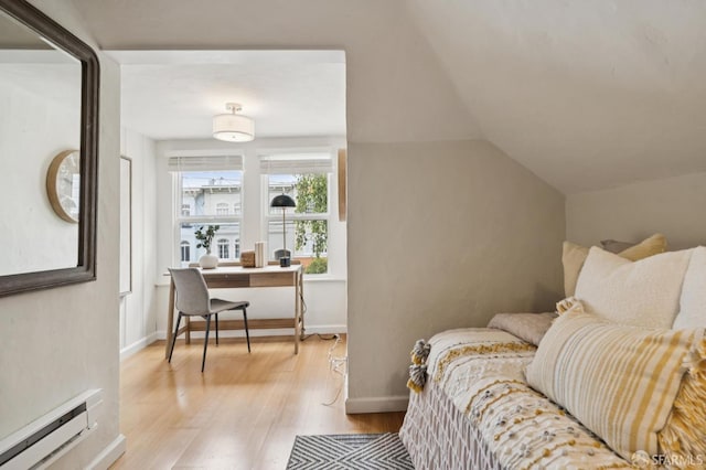 773 15th Ave, San Francisco, CA 94118 - bedroom featuring baseboard heating, light wood-type flooring, lofted ceiling, baseboards, and a desk