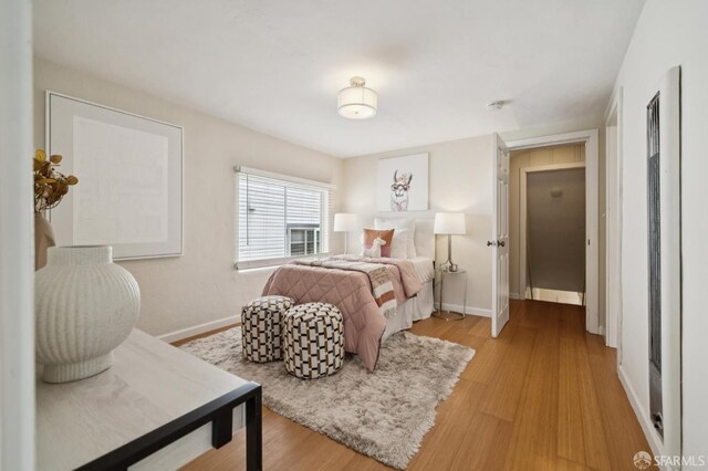 773 15th Ave, San Francisco, CA 94118 - bedroom with baseboards and light wood-style flooring
