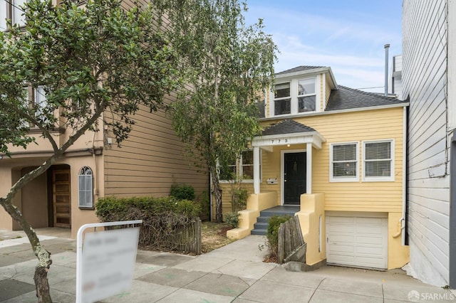 773 15th Ave, San Francisco, CA 94118 - view of front of house featuring a shingled roof, concrete driveway, and a garage