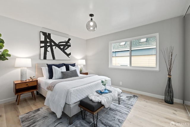 bedroom featuring light wood-type flooring