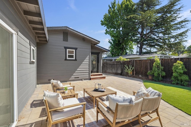 703 W St, Petaluma, CA 94952 - fenced backyard featuring outdoor lounge area and a patio