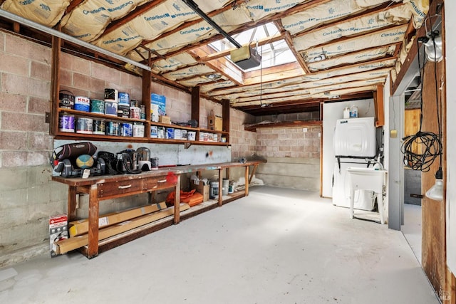 703 W St, Petaluma, CA 94952 - unfinished basement with a workshop area and a sink
