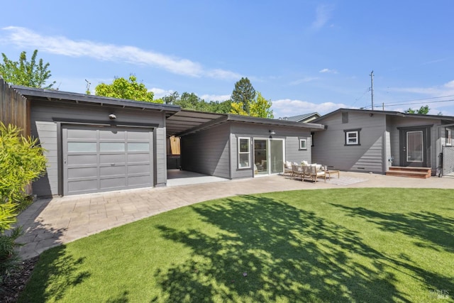 703 W St, Petaluma, CA 94952 - back of property with an attached garage, a lawn, and outdoor lounge area