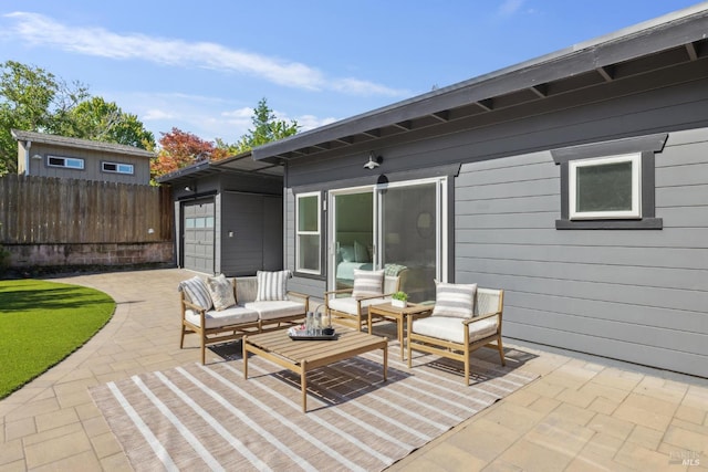 703 W St, Petaluma, CA 94952 - view of patio with an outdoor hangout area and a garage