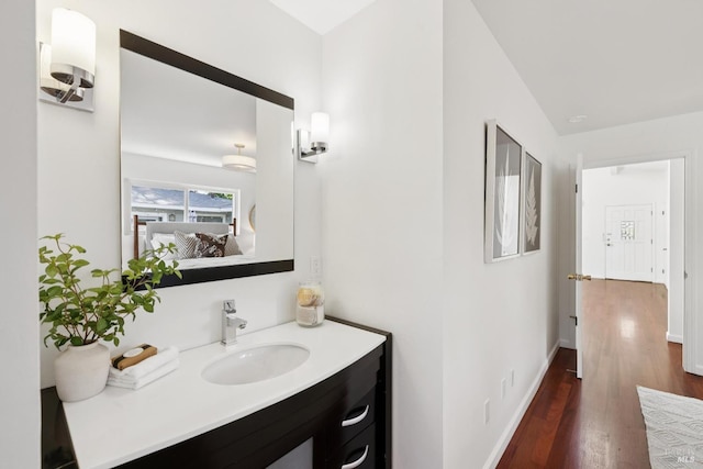703 W St, Petaluma, CA 94952 - bathroom featuring wood finished floors and vanity