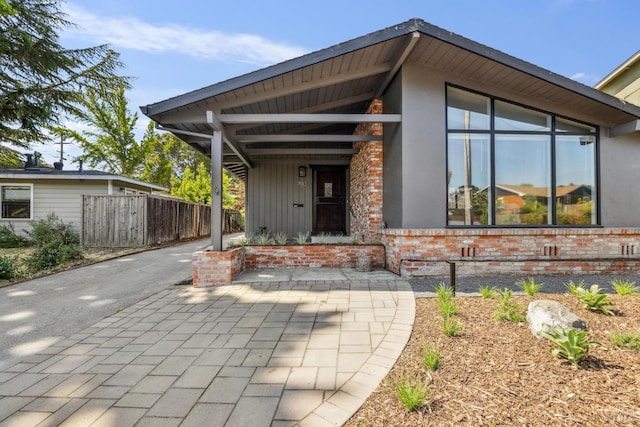 703 W St, Petaluma, CA 94952 - doorway to property with brick siding