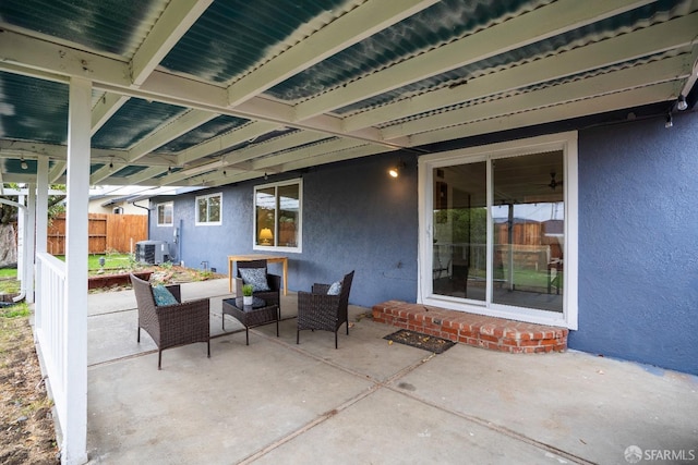 4301 Hillview Dr, Pittsburg, CA 94565 - view of patio featuring an outdoor hangout area, central air condition unit, and fence