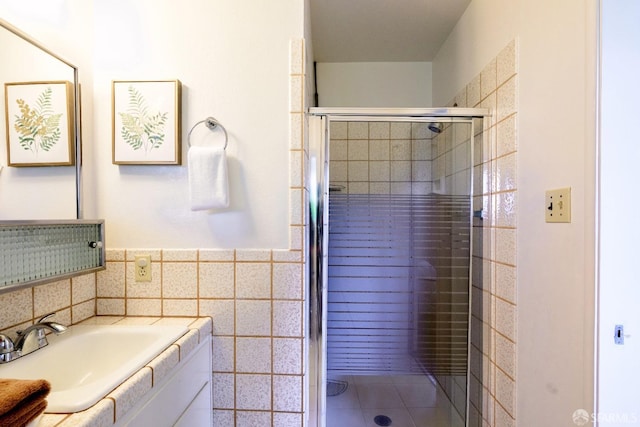 4301 Hillview Dr, Pittsburg, CA 94565 - bathroom with a shower stall, vanity, and tile walls