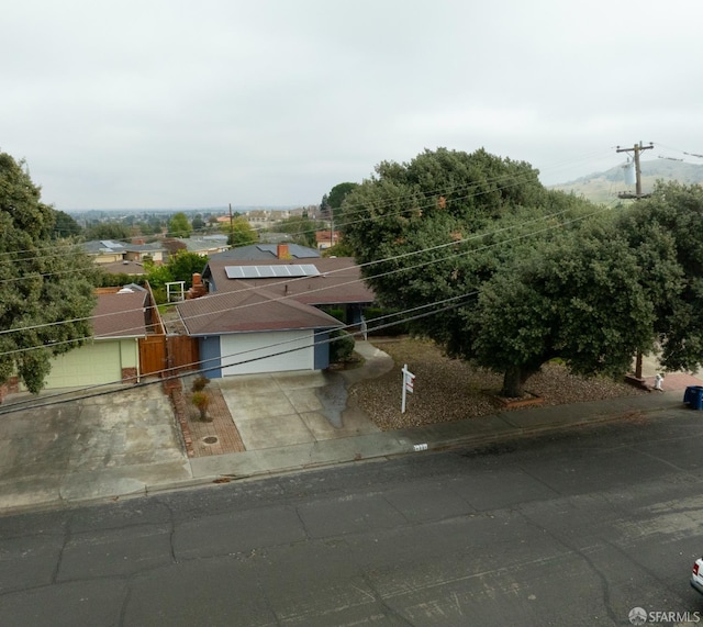 4301 Hillview Dr, Pittsburg, CA 94565 - view of front of home featuring fence and concrete driveway