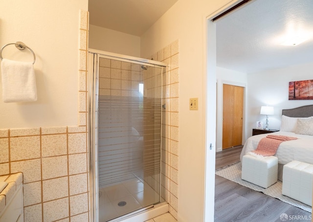 4301 Hillview Dr, Pittsburg, CA 94565 - full bathroom with a shower stall, wood finished floors, and ensuite bath