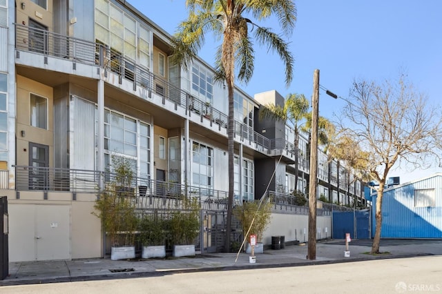 view of building exterior featuring central AC