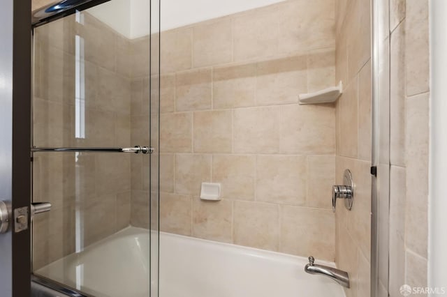 bathroom featuring enclosed tub / shower combo