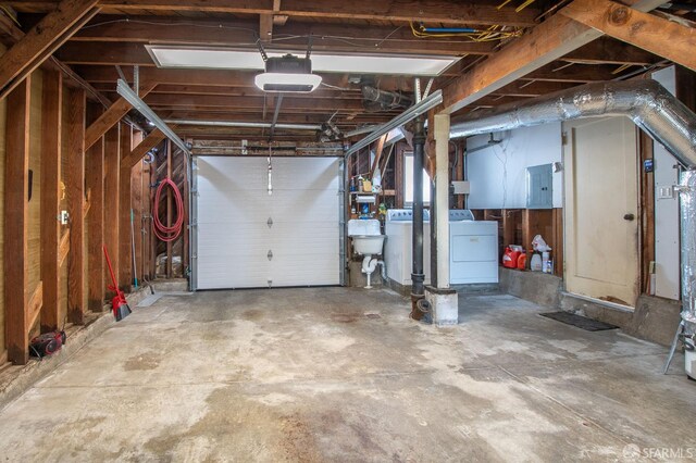 569 Peralta Ave, San Francisco, CA 94110 - garage featuring washing machine and clothes dryer, a garage door opener, and electric panel