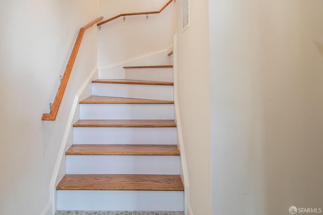 569 Peralta Ave, San Francisco, CA 94110 - stairway featuring baseboards