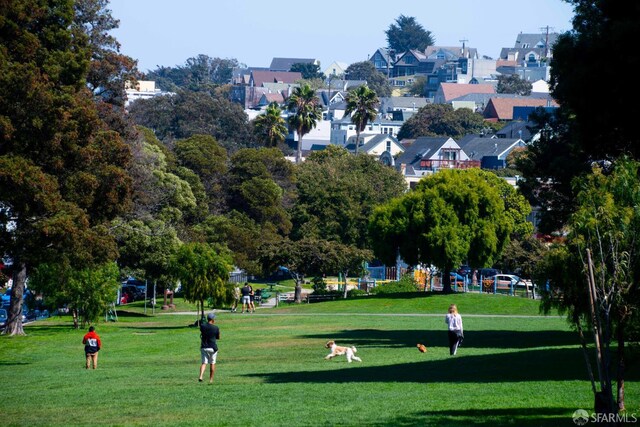 569 Peralta Ave, San Francisco, CA 94110 - view of property's community featuring a lawn and a residential view