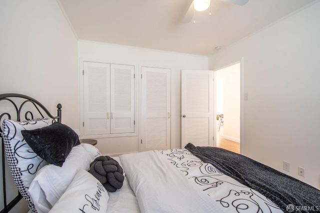 569 Peralta Ave, San Francisco, CA 94110 - bedroom featuring crown molding, ceiling fan, and multiple closets