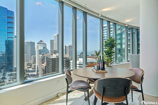 338 Main St Unit 35E, San Francisco, CA 94105 - dining space featuring baseboards and a view of city