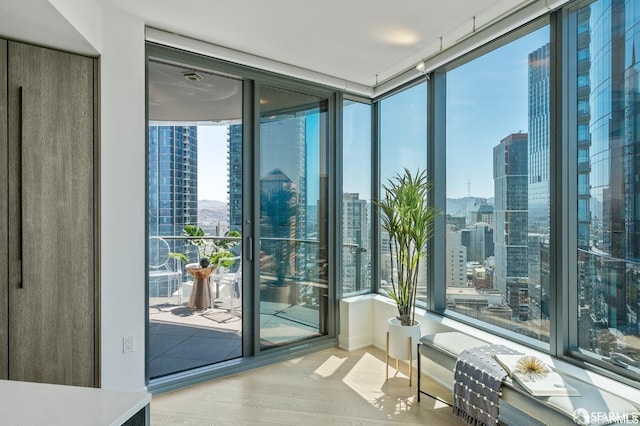 338 Main St Unit 35E, San Francisco, CA 94105 - doorway featuring expansive windows, wood finished floors, and a view of city