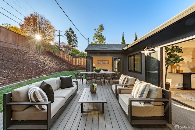 wooden deck with an outdoor hangout area