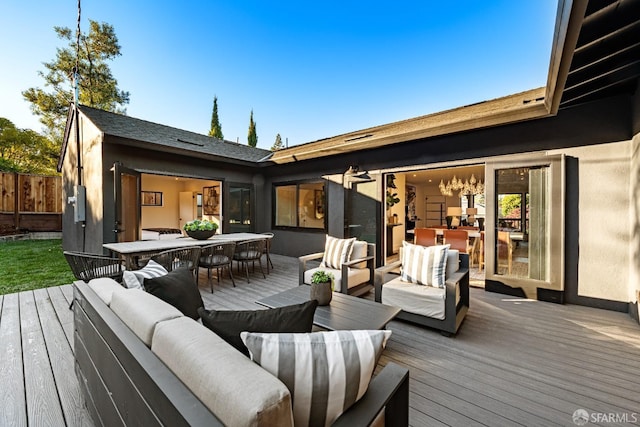 wooden deck with an outdoor hangout area