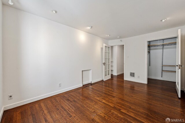 1375 Sacramento St, San Francisco, CA 94109 - unfurnished bedroom featuring wood finished floors, baseboards, and a closet