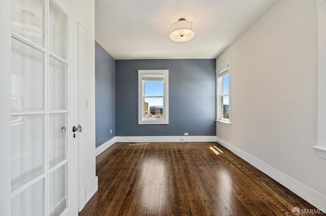 1375 Sacramento St, San Francisco, CA 94109 - empty room with plenty of natural light, wood finished floors, and baseboards