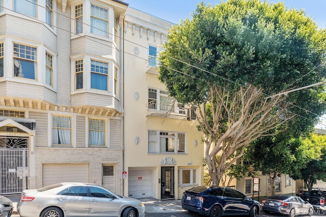 1375 Sacramento St, San Francisco, CA 94109 - view of building exterior featuring an attached garage
