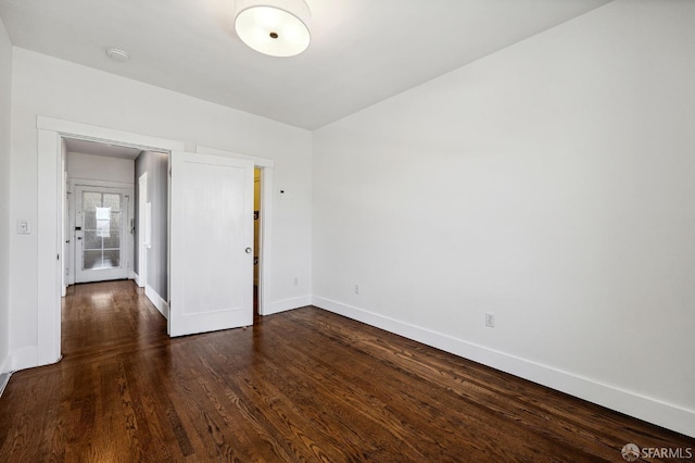 1375 Sacramento St, San Francisco, CA 94109 - spare room featuring baseboards, dark wood finished floors, and a smoke detector