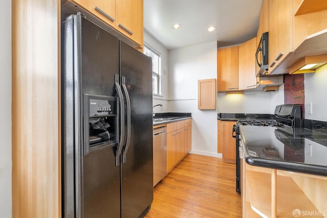 1375 Sacramento St, San Francisco, CA 94109 - kitchen featuring black appliances, light wood-style floors, baseboards, a sink, and recessed lighting