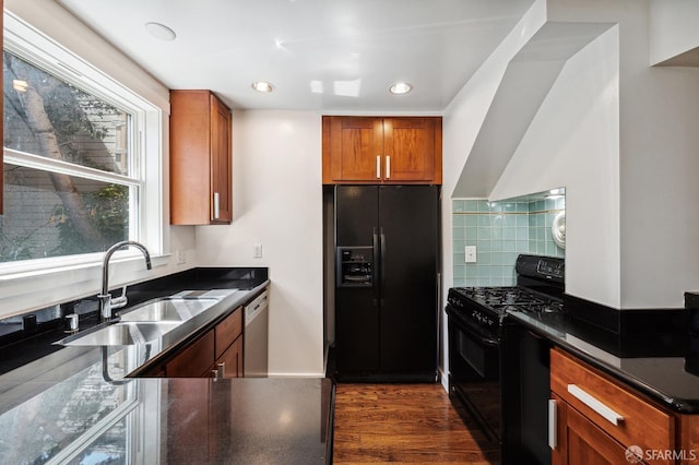 1375 Sacramento St, San Francisco, CA 94109 - kitchen with black appliances, a sink, dark countertops, decorative backsplash, and recessed lighting