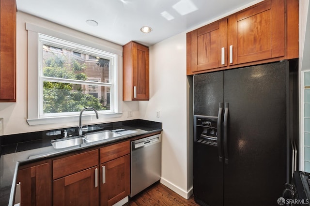1375 Sacramento St, San Francisco, CA 94109 - kitchen featuring black fridge, dishwasher, a sink, dark wood-type flooring, and brown cabinetry