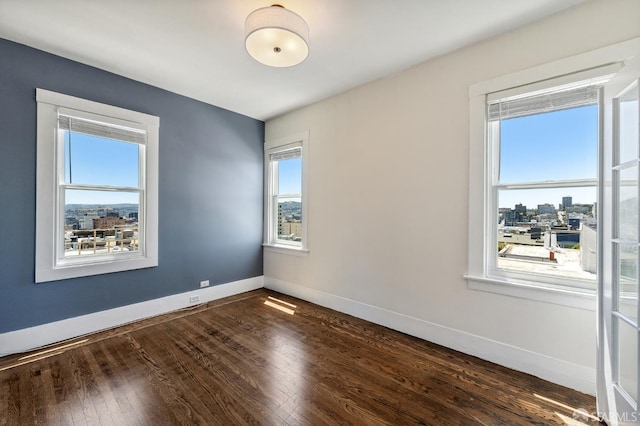 1375 Sacramento St, San Francisco, CA 94109 - empty room with dark wood-style flooring and baseboards